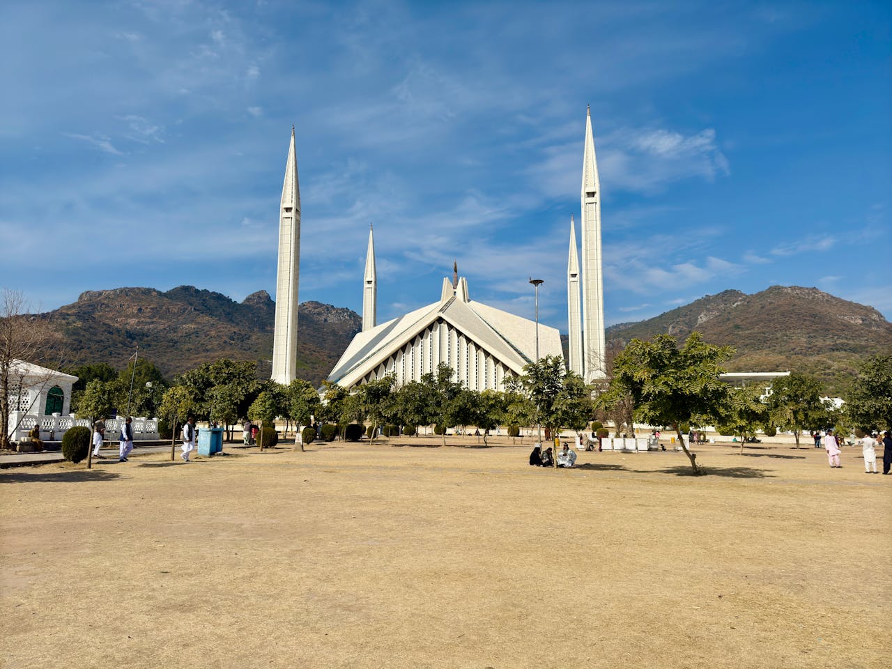 A magnificent view of Faisal Mosque with Margalla Hills in Islamabad, Pakistan.
